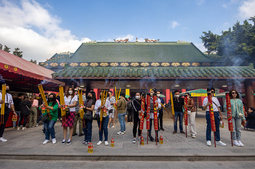 Hong Kong - February 7, 2023 : Worshippers at the Che Kung Temple in Tai Wai, Sha Tin District, Hong Kong.