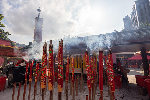 Hong Kong - February 7, 2023 : Large joss sticks burn at the Che Kung Temple in Tai Wai, Sha Tin District, Hong Kong.