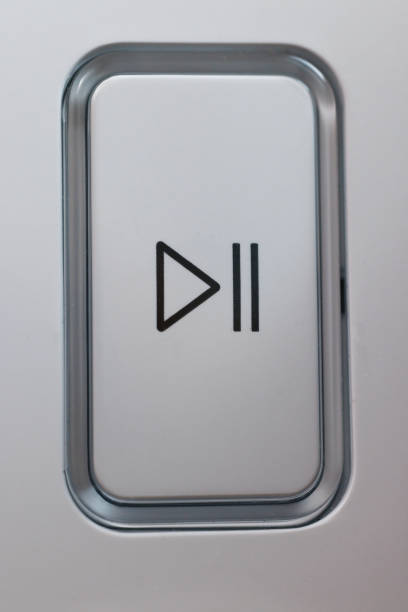Close-up button switch on the washing machine. Start-stop the wash cycle. Buttons and knobs modern washing machine.