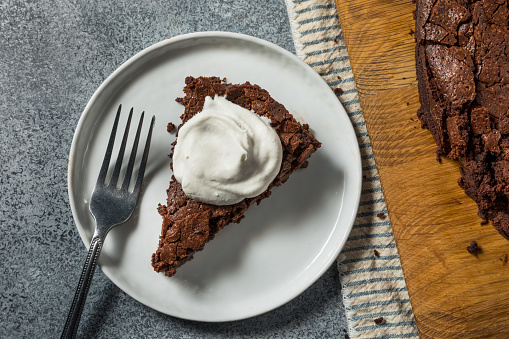 Hearty Gluten Free Flourless Chocolate Cake with Whipped Cream