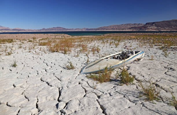 Abandoned Boat On Dried Shores of Lake Mead stock photo