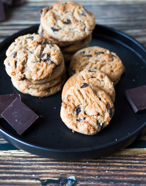 istock Chocolate cookies with pieces of chocolate 1463863373