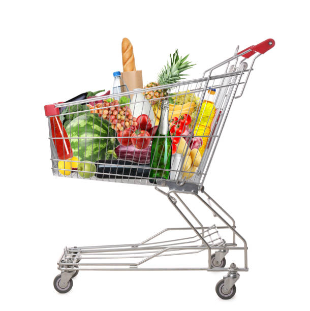 istock Shopping cart with groceries on white background 1463869709