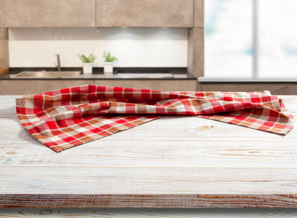 istock Napkin on wooden desk. Kitchen background. 1463869865