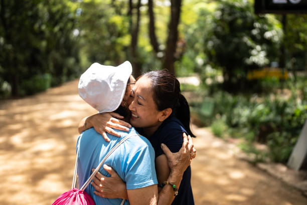 istock Mother and daughter talking on the public park 1463872824