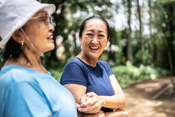 istock Mother and daughter talking on the public park 1463872933