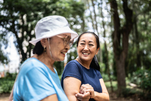 istock Mother and daughter talking on the public park 1463872940