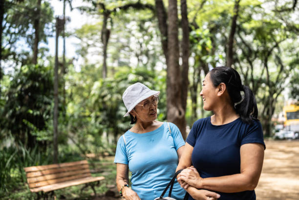 istock Mother and daughter talking on the public park 1463872952