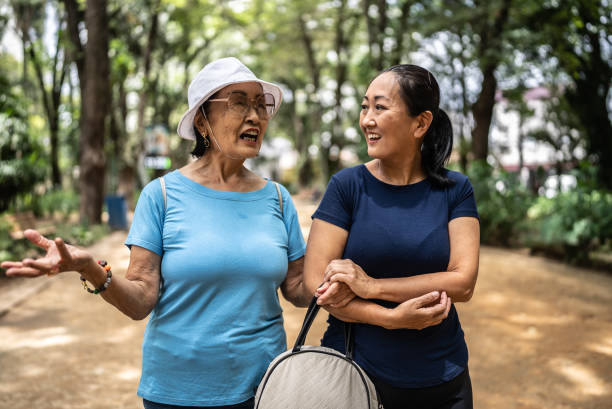 istock Mother and daughter talking on the public park 1463872963