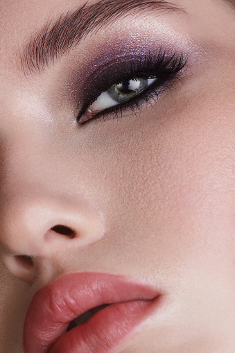 Closeup of woman eye with beautiful colorful makeup