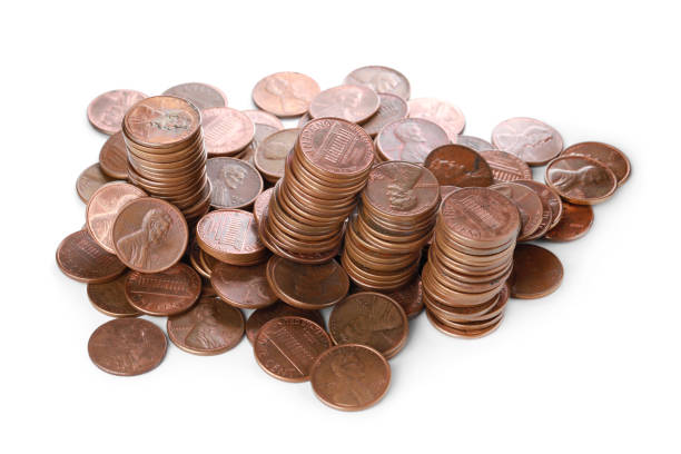 istock Many different American coins on white background 1463873735