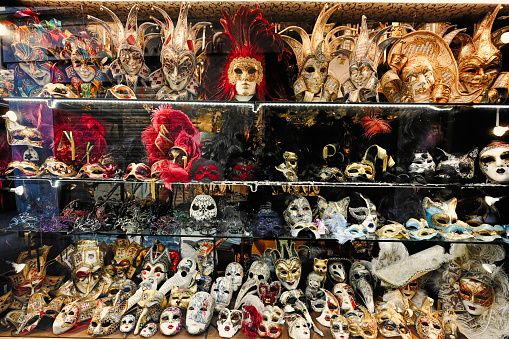 Venetian masks in store display in Venice, Italy.
