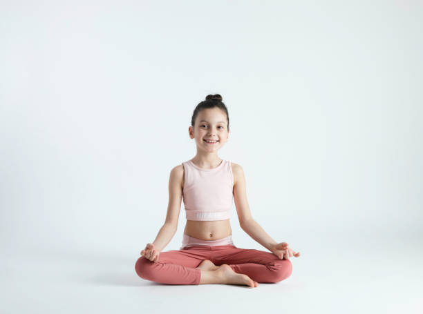 istock Cute Girl Doing Yoga 1463876679