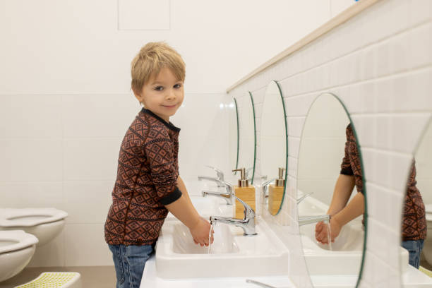 istock Child, washing hands in kindergarden 1463879883