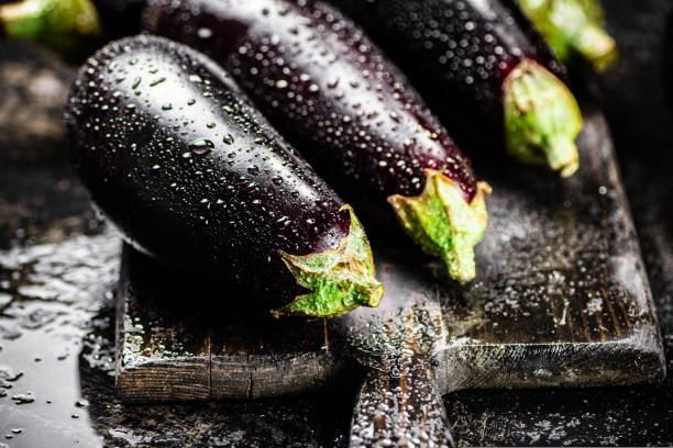 istock Ripe eggplant with droplets of water. 1463879957