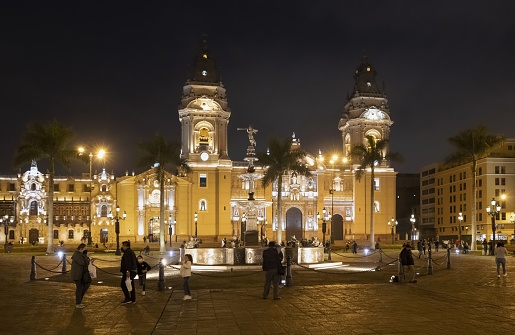 Lima, Peru, November 2, 2021: View of the Cathedral of Lima on the main square Plaza de Armas in the evening.