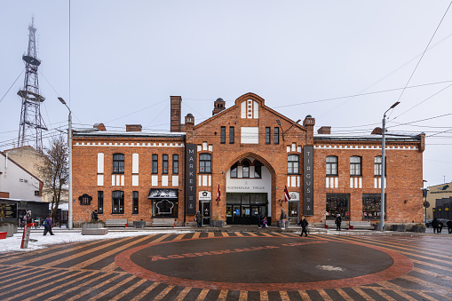Riga, Latvia – February 5, 2023: Open since 1898, Agenskalns Market is the oldest and largest market in the Agenskalns suburb of Riga, and it is has been granted state cultural monument