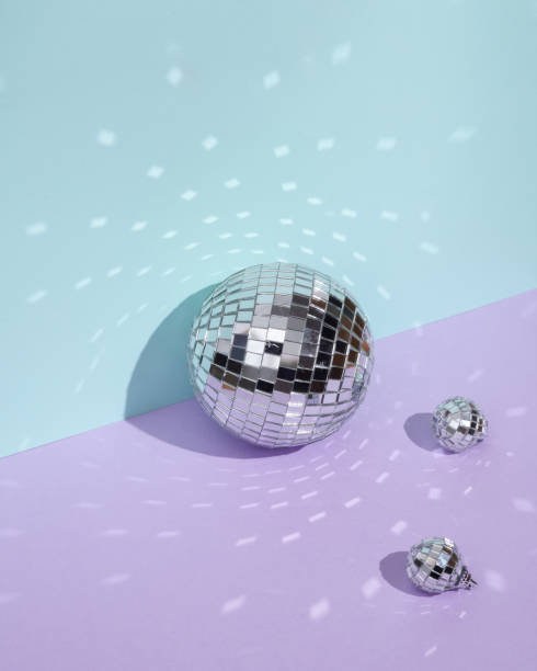 istock Creative minimal still life with mirrored disco balls on pastel background. Party concept. visual trend. Retro aesthetic 1463885554