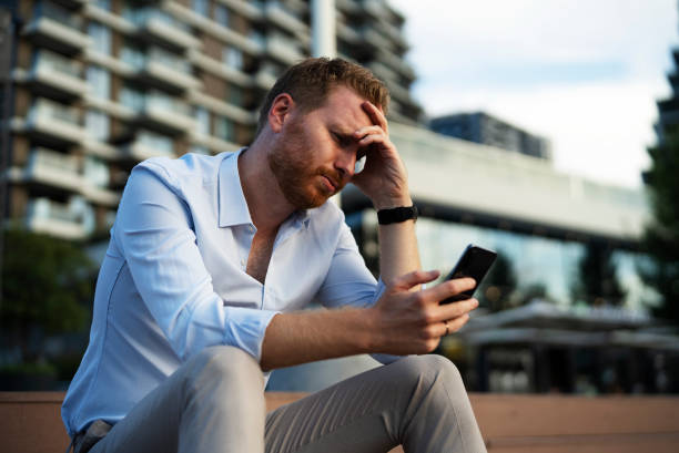 istock Angry upset man talking to the phone 1463889042