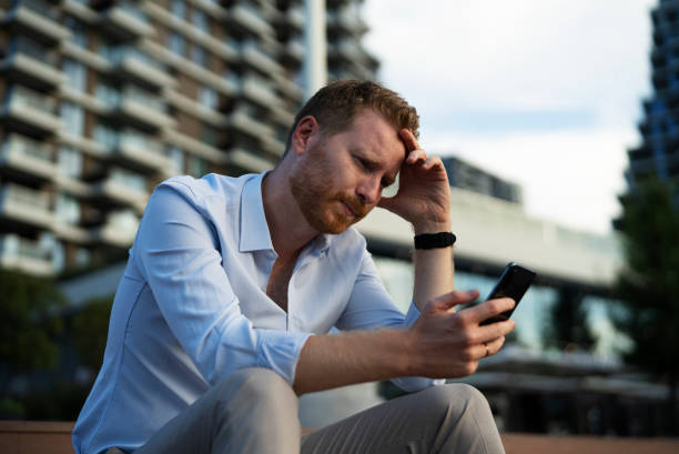 istock Angry upset man talking to the phone 1463889045