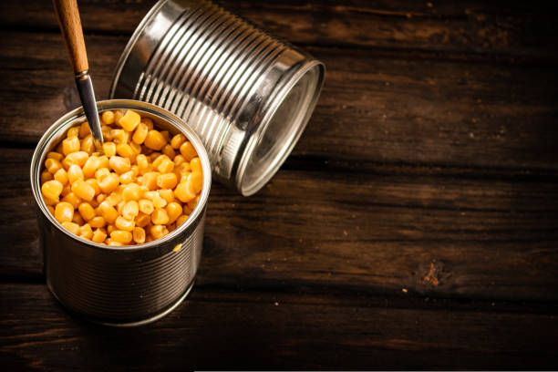 istock An open can of canned corn. 1463891988
