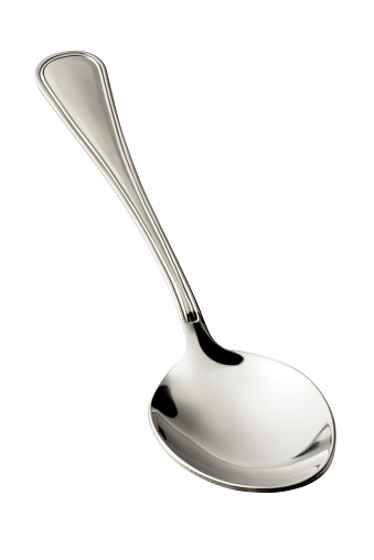 Empty steel Spoon isolated on white background