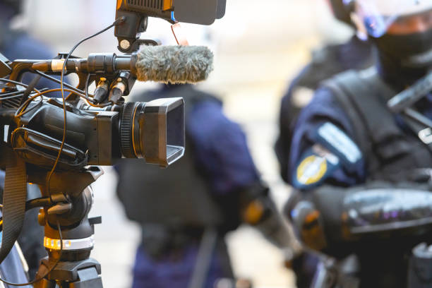 Report from the street protest Television cameras broadcast street protests live tripod attack stock pictures, royalty-free photos & images