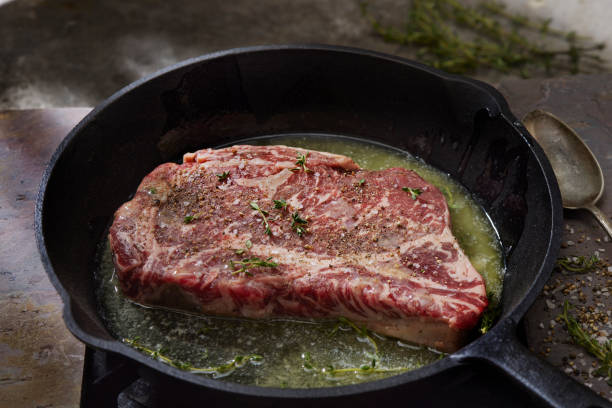 istock Pan Searing Beef Eye Rib Steak 1463896415