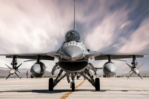  FA-18 airplane against a blue sky.