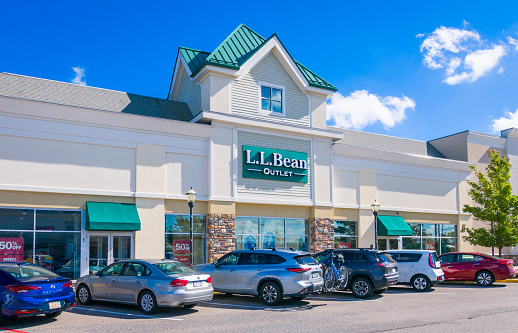 Wareham, Massachusetts, USA- September 26, 2022- Every parking spot in front of the popular L.L. Bean outlet store in Wareham Crossing is filled with the cars of shoppers hoping to find a bargain at this iconic high quality outdoor products store.