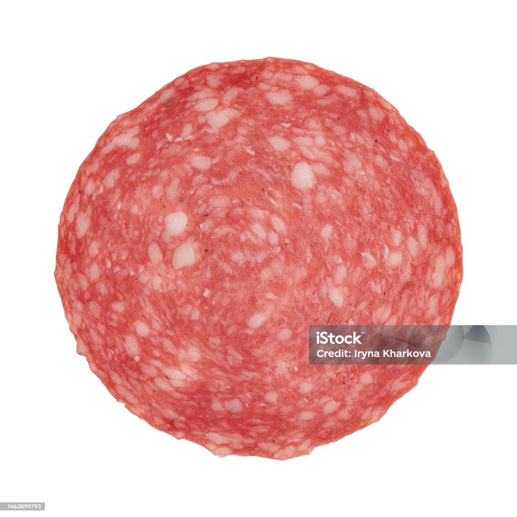 salami sausage cut into pieces isolated on white salami sausage slice isolated on white background, one piece of sliced salami sausage laid out to create layout Salami Stock Photo