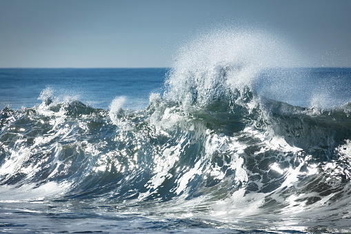Scenic Surf Wave Breaking offshore spray in Carlsbad, San Diego, California