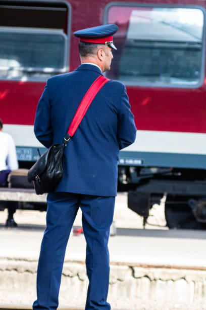 Train crew doing checkings on the platform at Bucharest North Railway Station in Bucharest, Romania, 2023