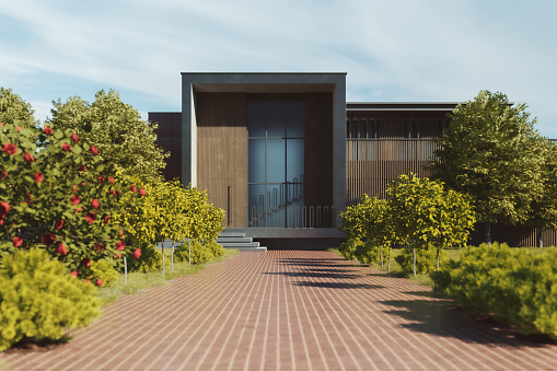Empty driveway with lush garden in front of the house. 3D generated image.