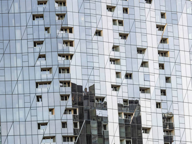 istock Close up of glass skyscraper 1463912752