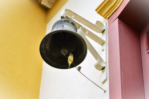 Golden bell isolated on the white background