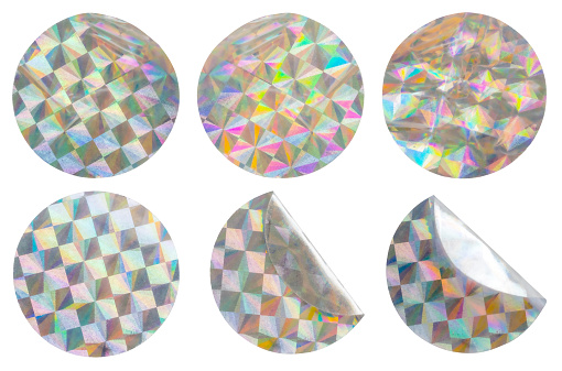 Blank round adhesive holographic foil sticker label set isolated on white background