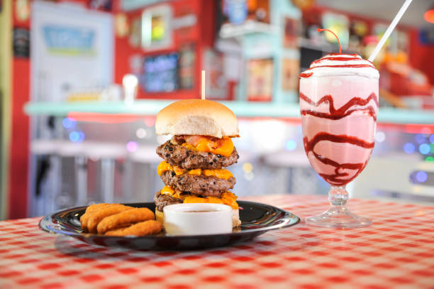 istock cheeseburger and strawberry milkshake 1463943185
