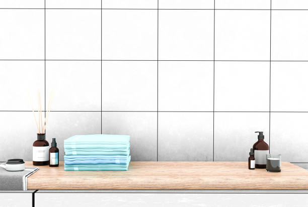 istock Laminated marble bathroom shelf with hygiene accessories and towels. 1463946883