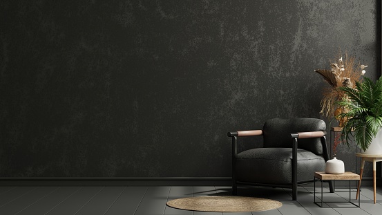 Wall mockup in black tones with leather armchair on dark wall.3d rendering