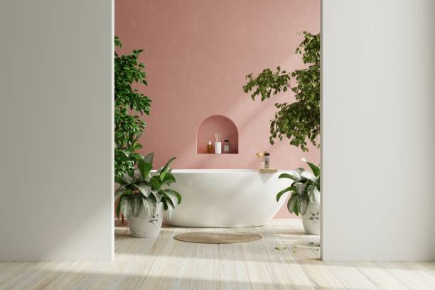Modern Bathroom interior design,white bathtub on grunge pink wall.