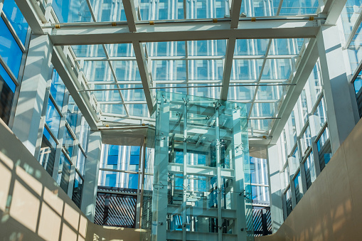 Transparent elevators and patio skylights