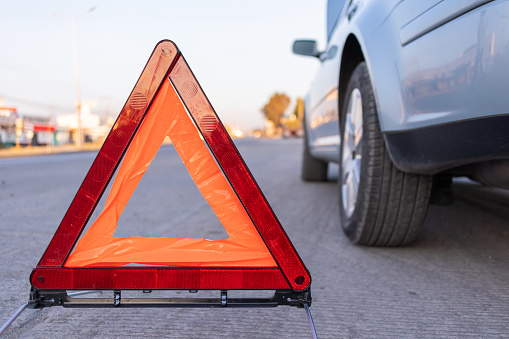 preventing accidents using a hazard triangle on the road