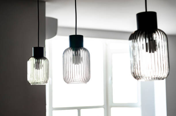 istock Glass ceiling lamps in white interior. Design 1463969497