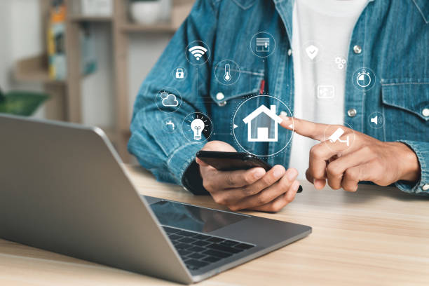 istock Smart home technology concept. Control all the functions of your home through your smartphone. Home automation system. Technology of the future. 1463983302