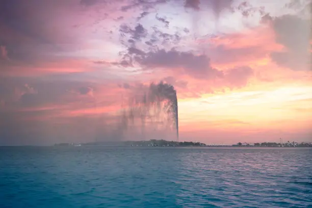 ​

​King Fahd's Fountain in Jeddah  is one of the 6 tallest fountains in the world​. Yes it should be true. I was enjoying the view from the park nearby but the park is already almost 1 km away from the fountain but I still could see the fountain clearly from the park. 
Also the sunset on that day was naturally beautiful with magic colors.