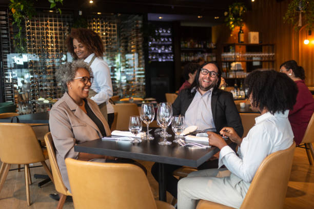 istock Business people having lunch in a sophisticated restaurant 1463987120