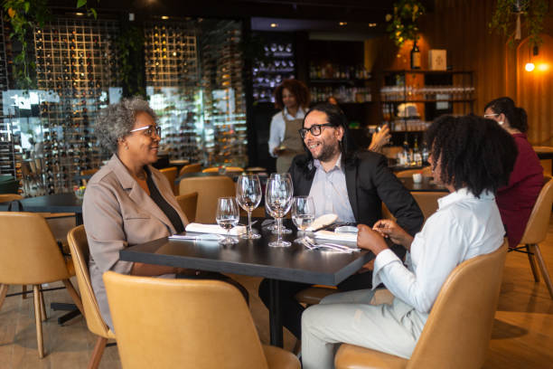 istock Business people having lunch in a sophisticated restaurant 1463987131