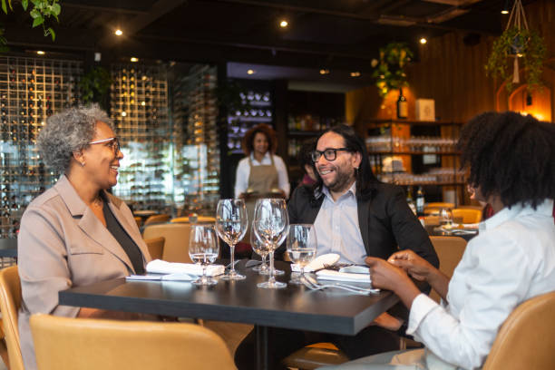 istock Business people having lunch in a sophisticated restaurant 1463987132