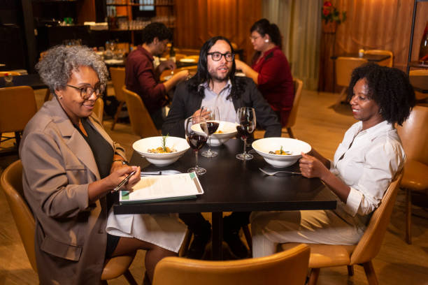 istock Executives at a business dinner in a sophisticated restaurant 1463987348